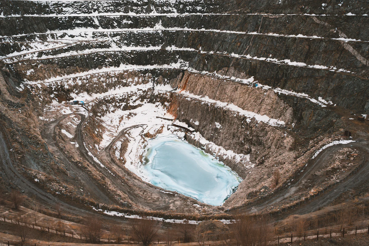 Aerial view of a terraced open-pit mine